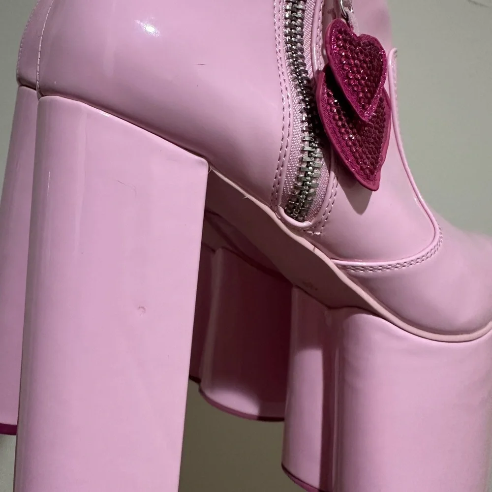 Dolls Kill Glossy Pink Platform Boots with Heart Accents